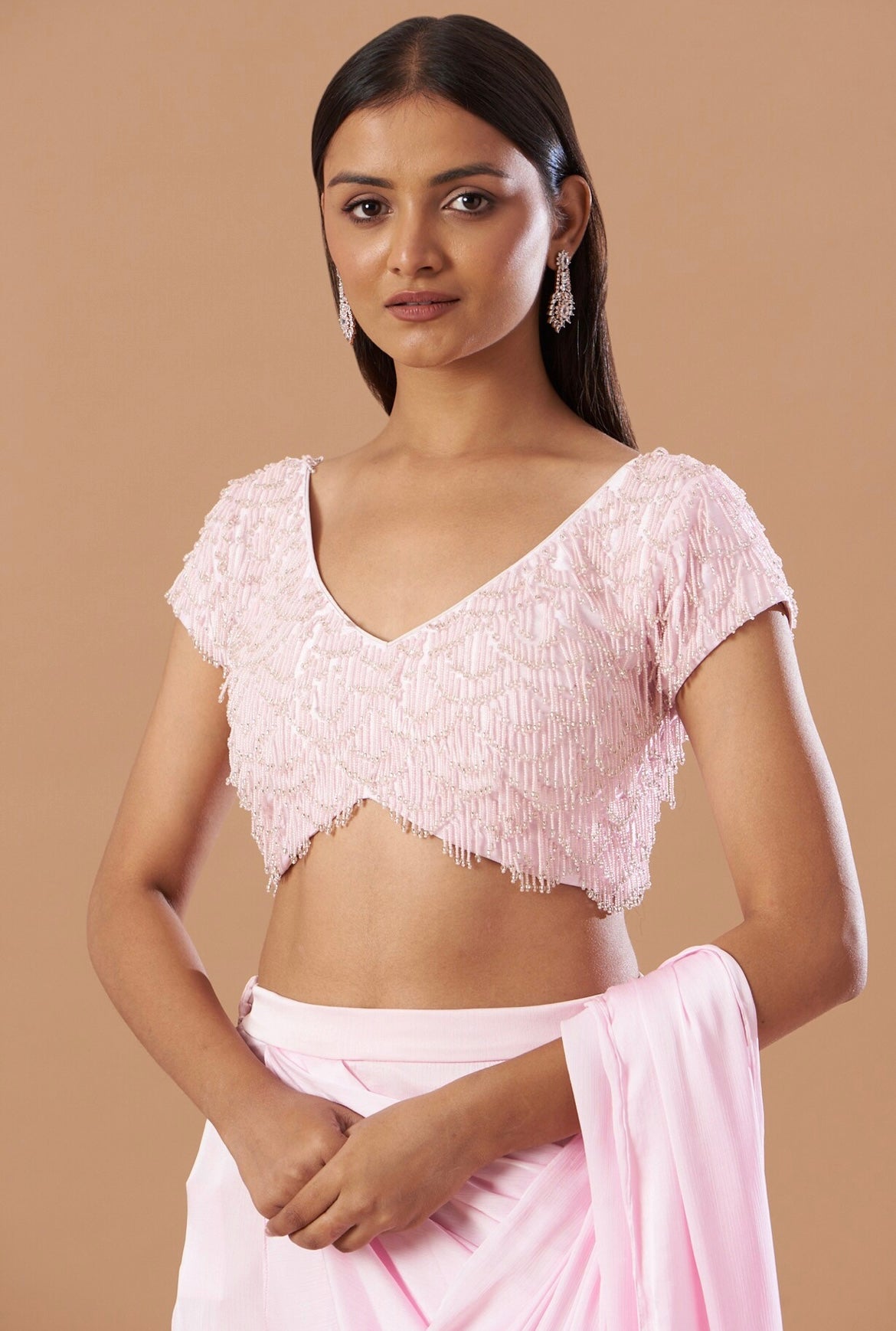 Blush Pink chinnon pre-draped saree with tassel work blouse