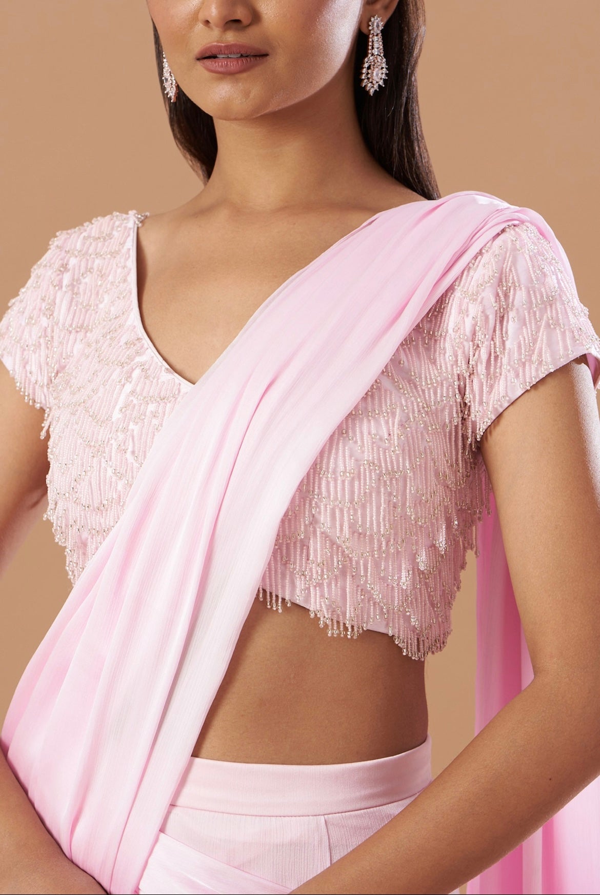 Blush Pink chinnon pre-draped saree with tassel work blouse