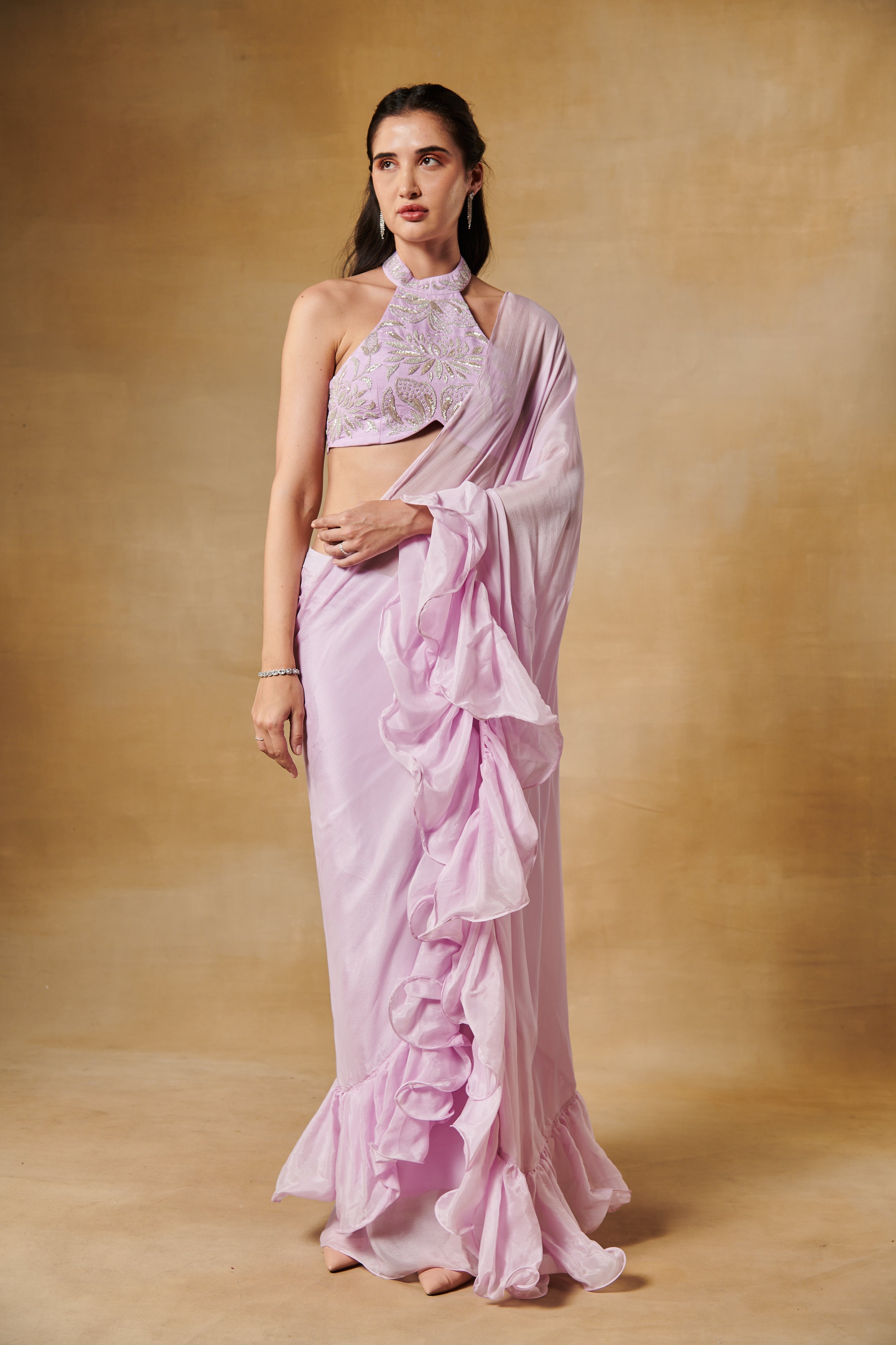 Blush lavender ruffle saree with haulter beaded blouse