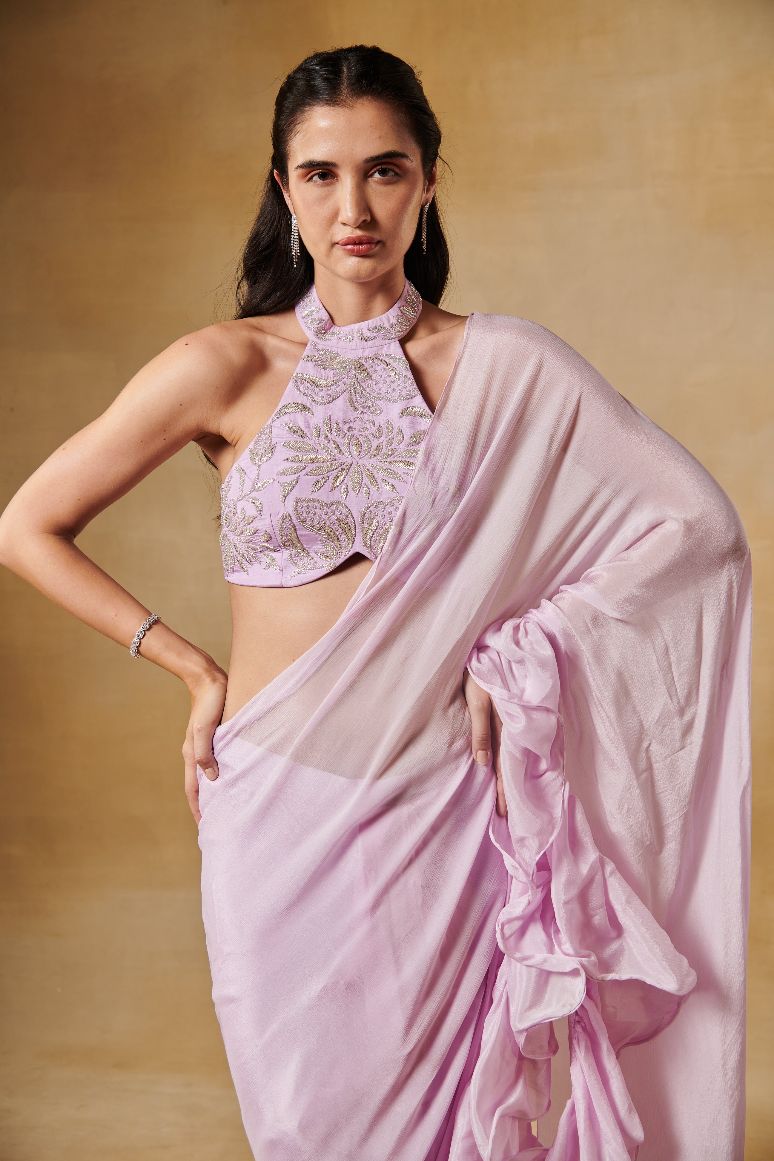 Blush lavender ruffle saree with haulter beaded blouse