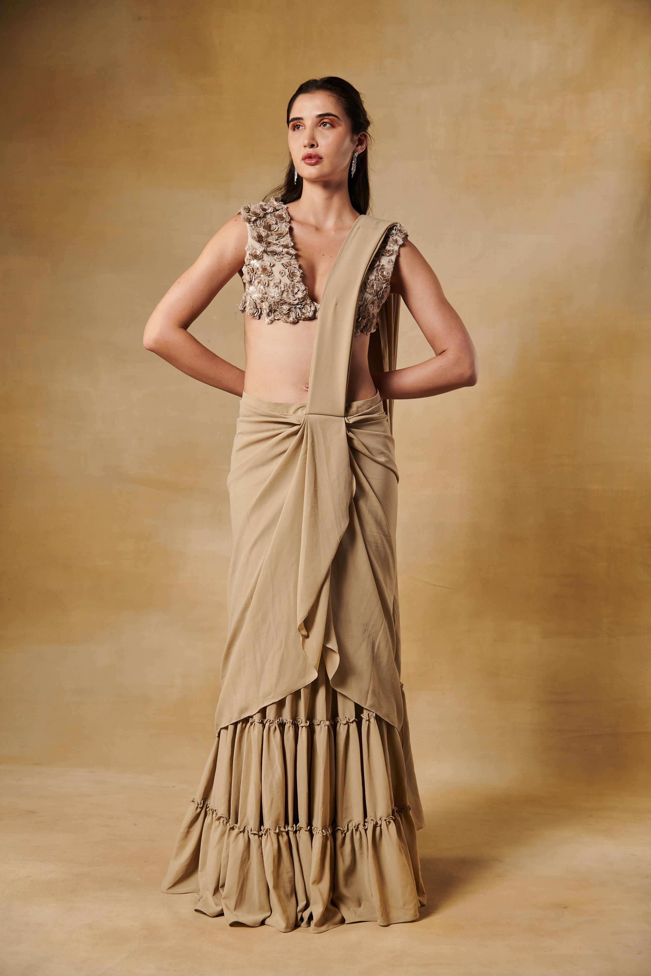 Tan beige ruffle layered predraped saree with 3D flowers blouse