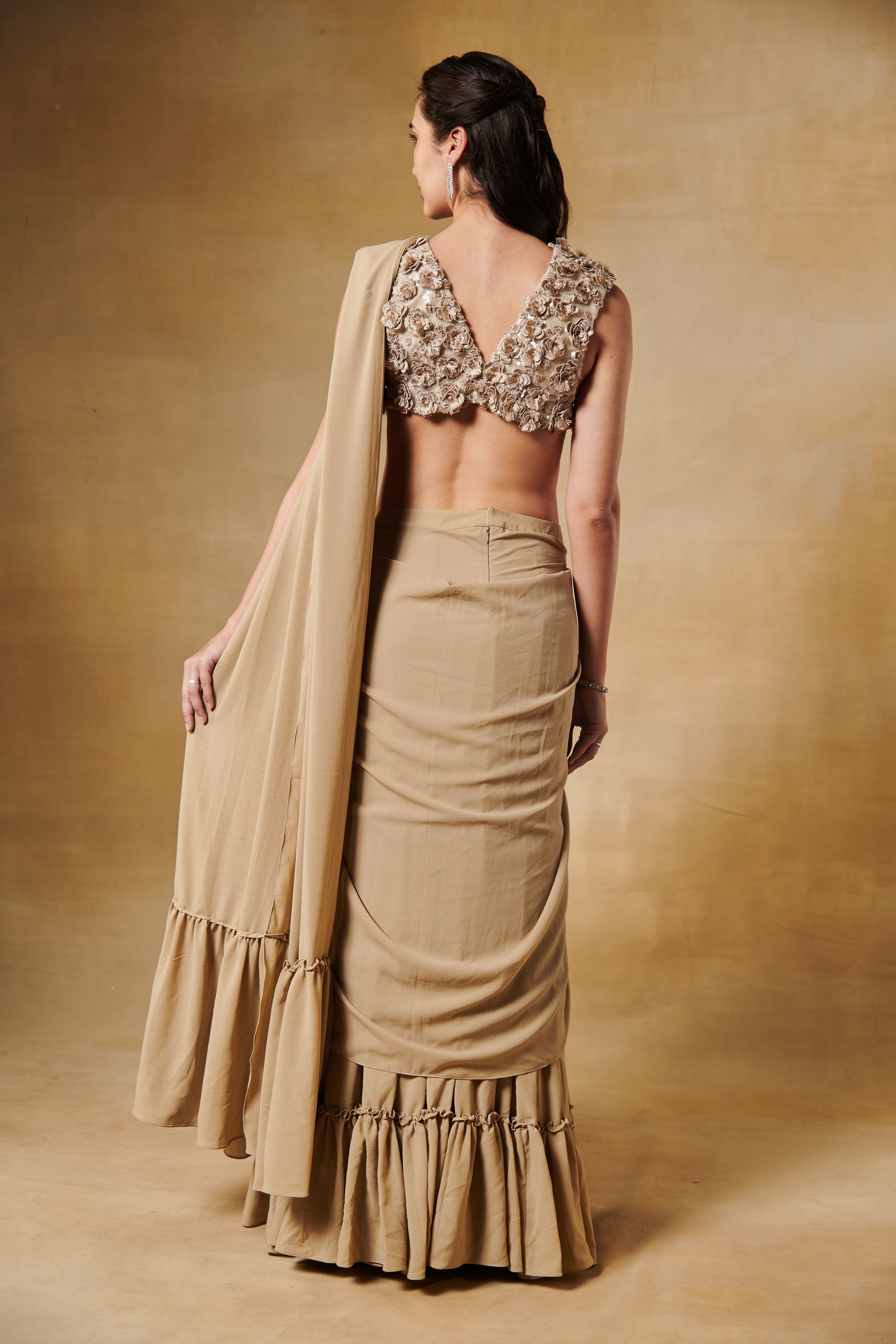 Tan beige ruffle layered predraped saree with 3D flowers blouse