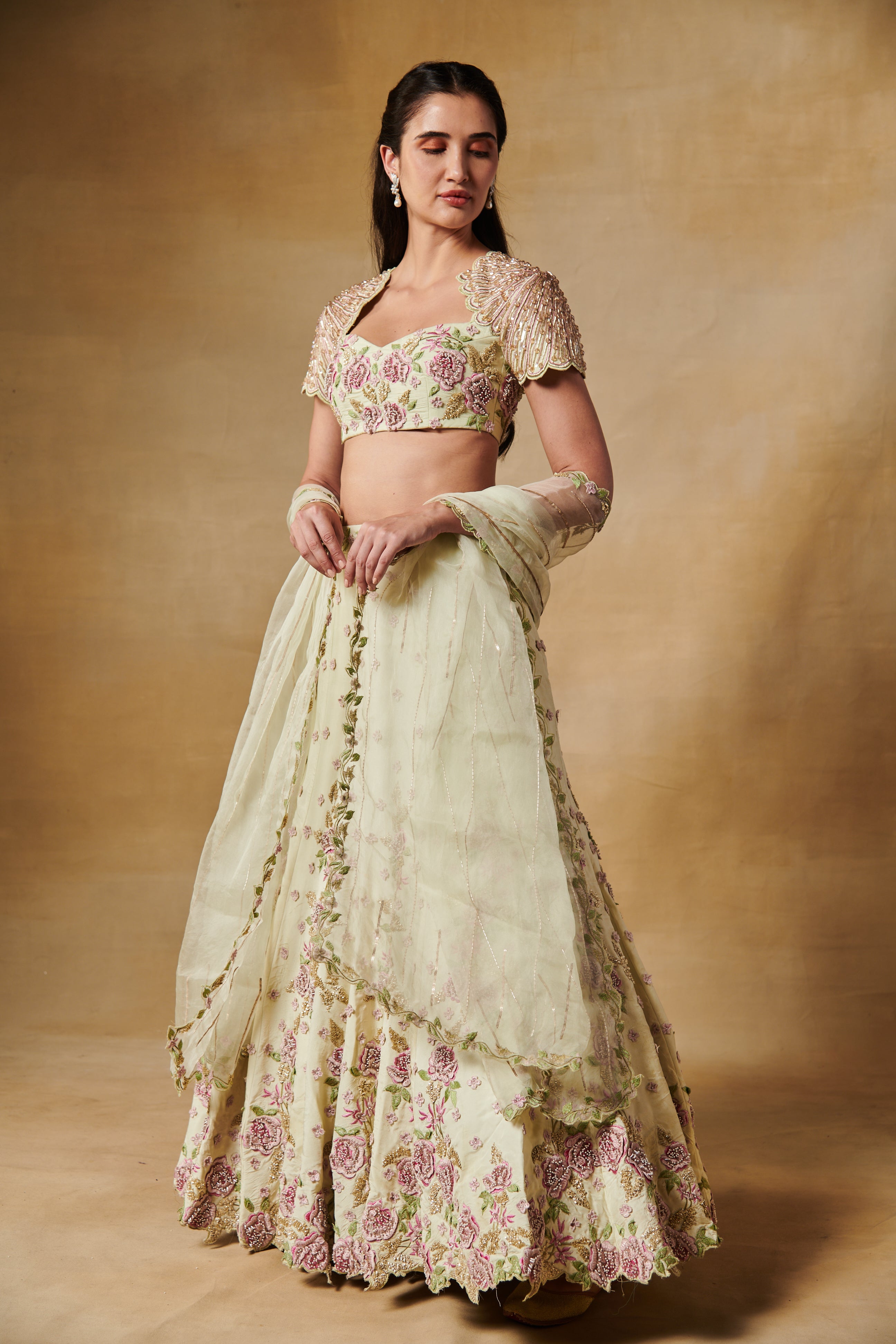 Mint green lehenga set with 3D heavy embroidered floral motifs