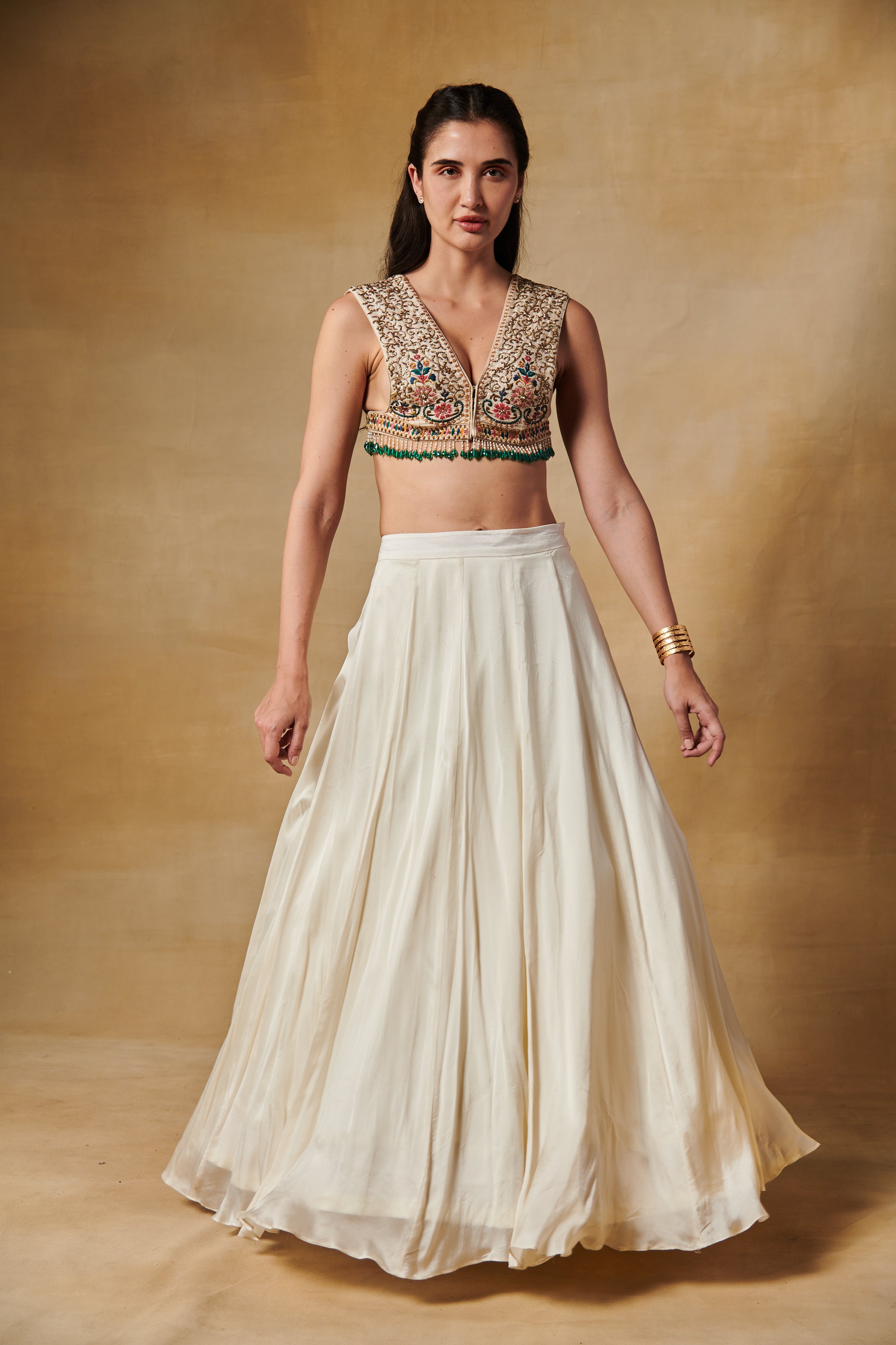 Ivory lehenga set with multi thread embroidery blouse