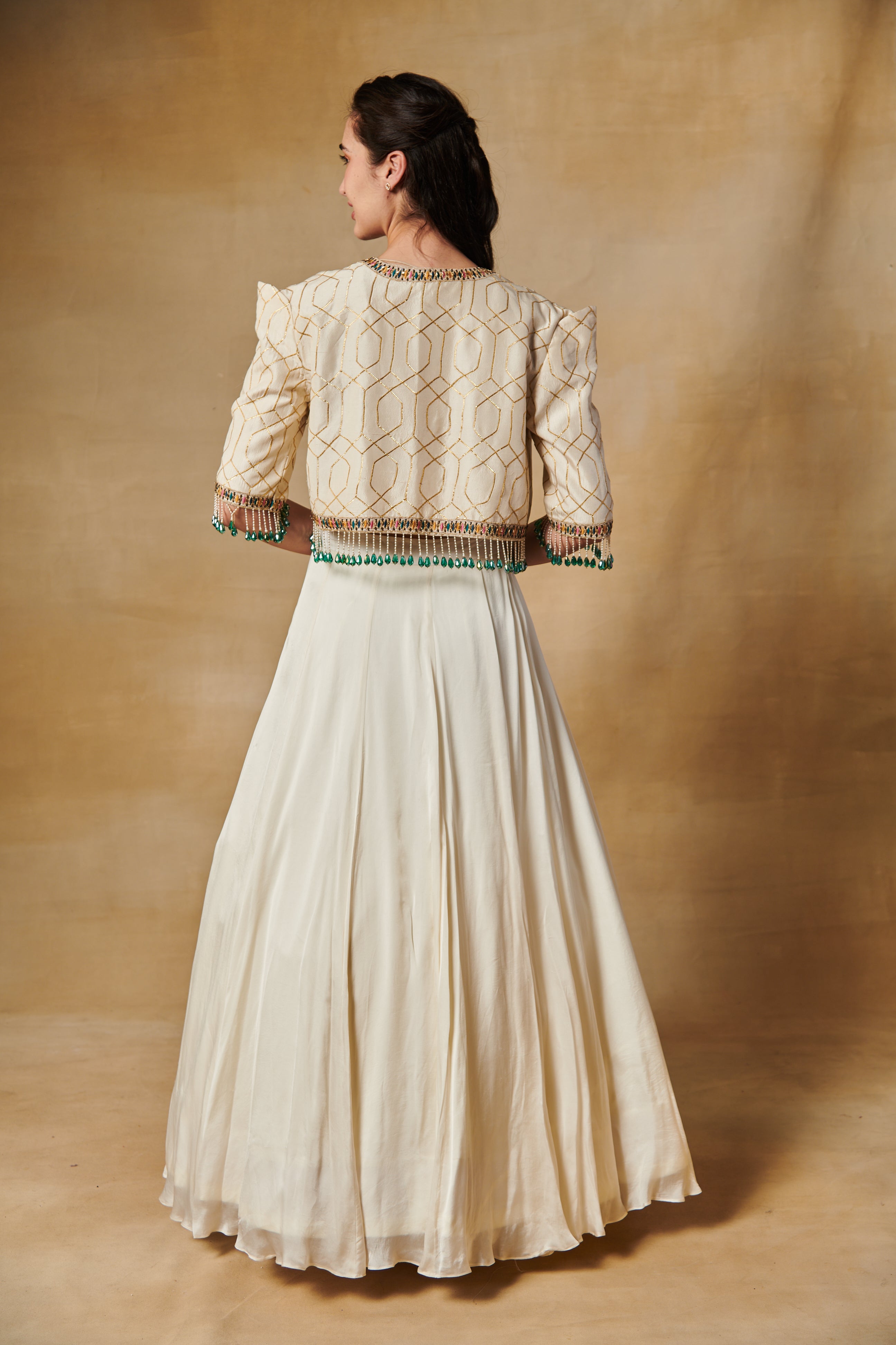 Ivory lehenga set with multi thread embroidery blouse