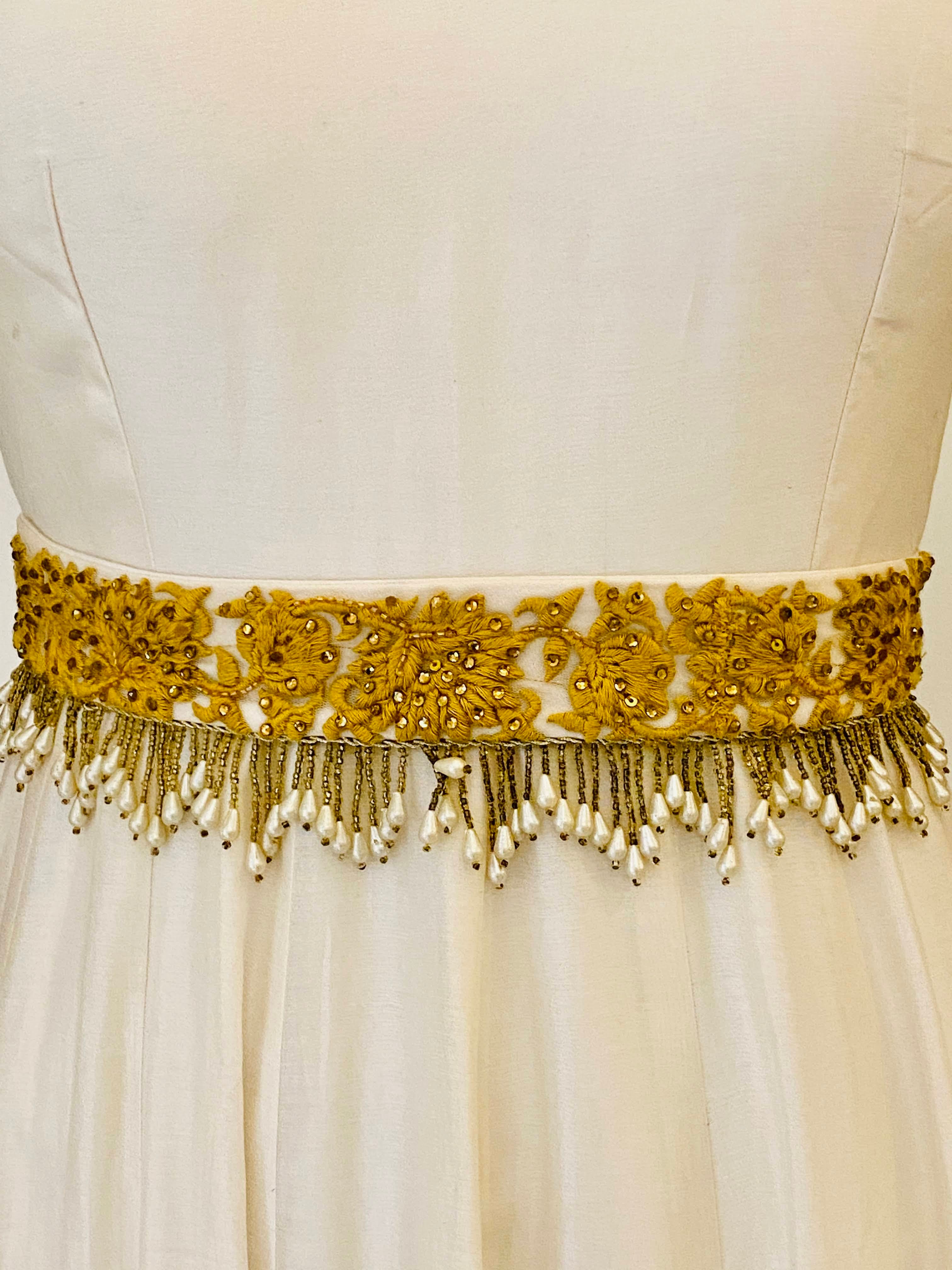 Ivory Chanderi Anarkali with mustard thread work and belt